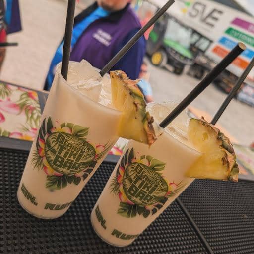 Stack of colourful custom printed festival cups