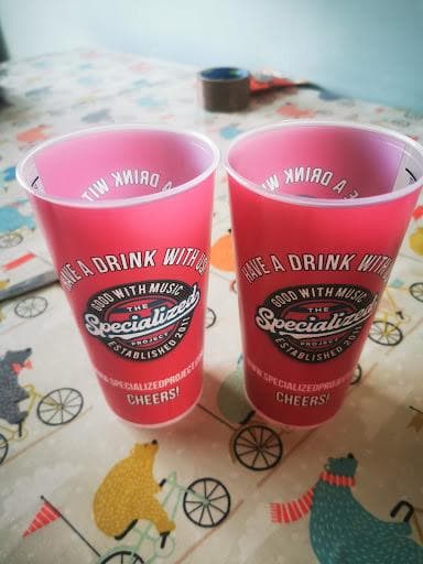 EcoCups branded reusable cups being used at a festival