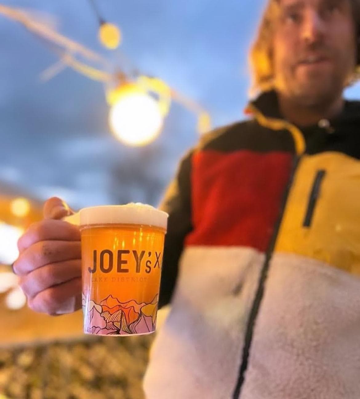 Festival goers with eco cups